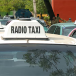A line of radio taxis parked in an urban area with rooftop “RADIO TAXI” signage prominently displayed on multiple vehicles. The image represents radio advertising in India through branded taxi networks commonly used for transit and outdoor promotional campaigns in high-traffic city locations.