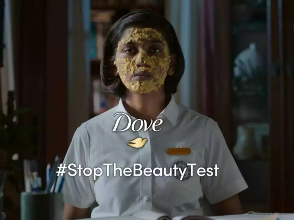 This image shows a girl with a face pack on her face as a part of #StopTheBeautyTest Dove’s Marketing Campaign