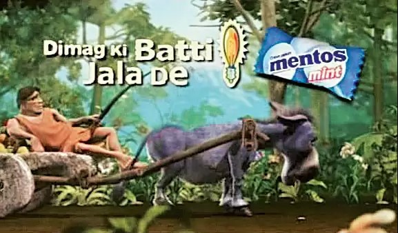 This image shows the popular marketing campaign of Mentos “Dimag ki batti jala de” featuring a man on a cart and a donkey