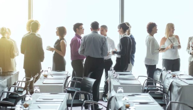 A picture showing a group of people in an event.

