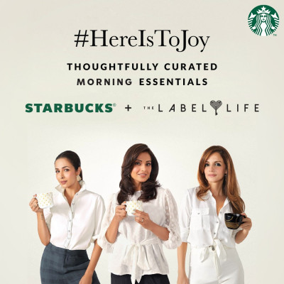 This image shows three celebrity ladies holding a cup in a collaboration with Starbucks and the Label Life