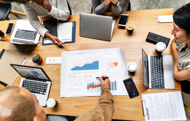 showing people discussing offline marketing activities