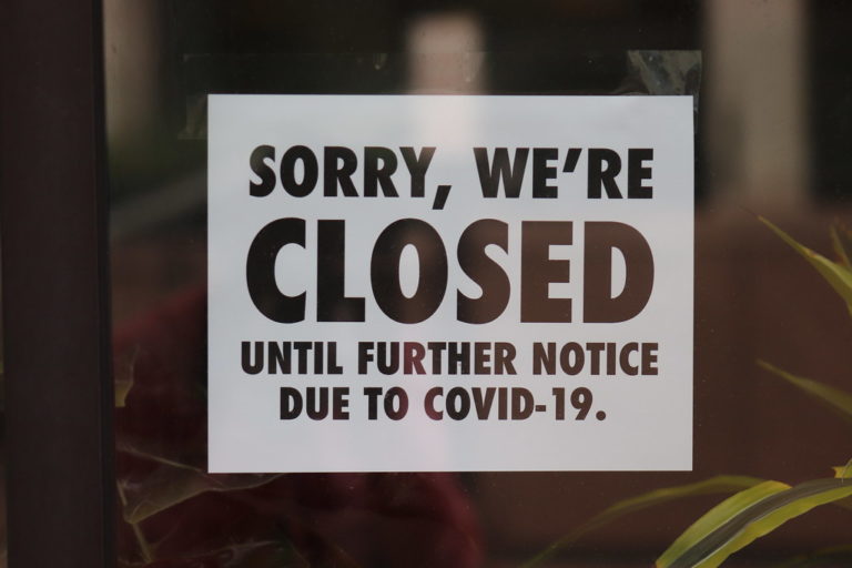 This image shows a paper stuck at the shop saying the shop is closed until further notice due to the pandemic