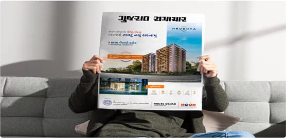 This image shows a newspaper ad for a real estate brand
