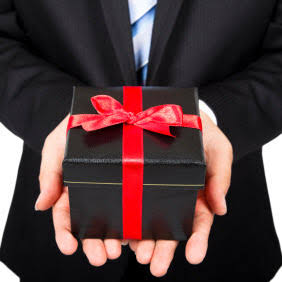 It shows a man opening a gift
