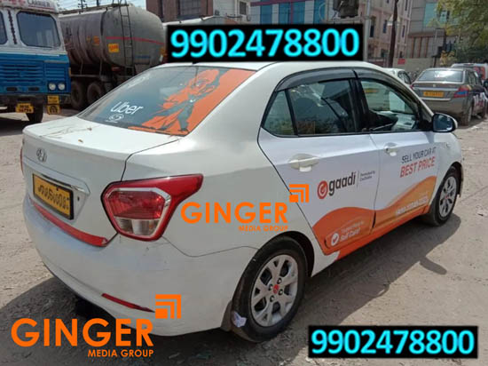 Cab Advertising in Agra with white and orange color