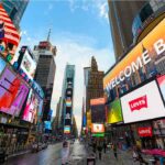 Various digital billboards on a street