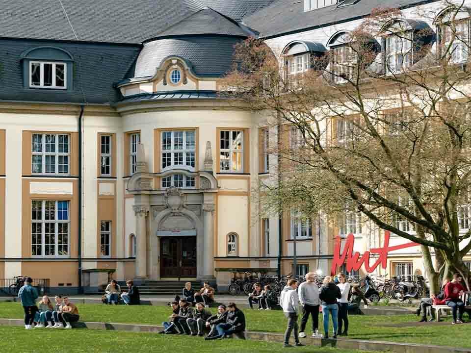 A crowd in the school ground for admissions