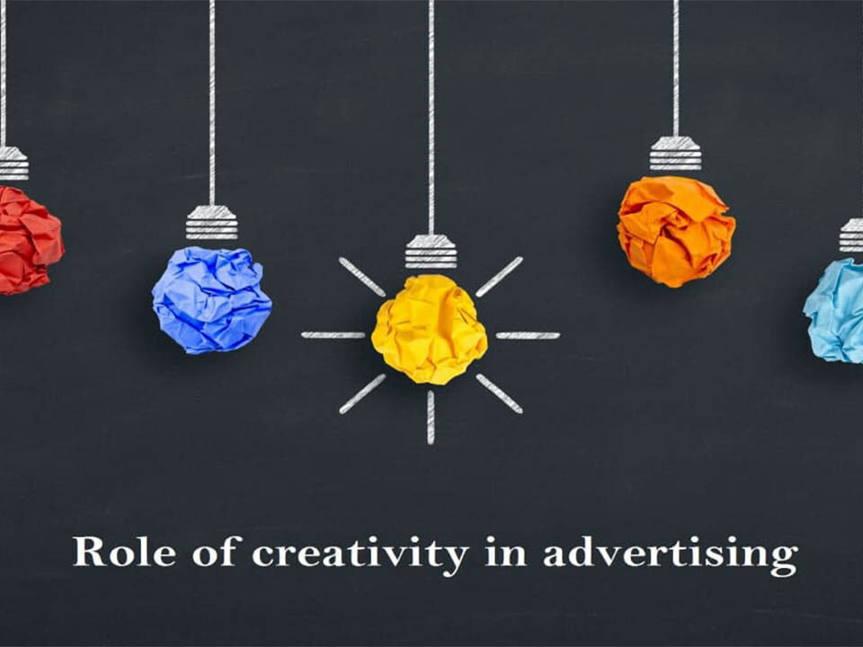 Five coloured bulbs on a black background.