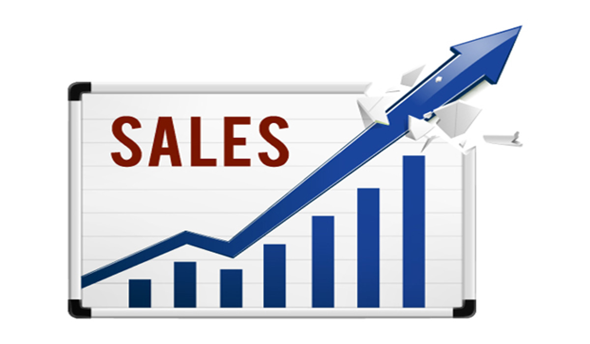 An increasing arrow and bar graph of sales.
