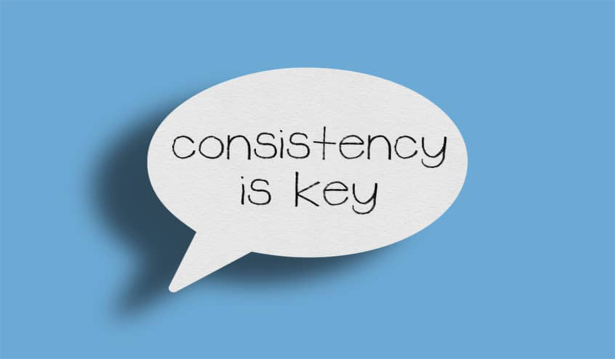 A thought bubble on a blue background with the tag “consistency is the key”.
