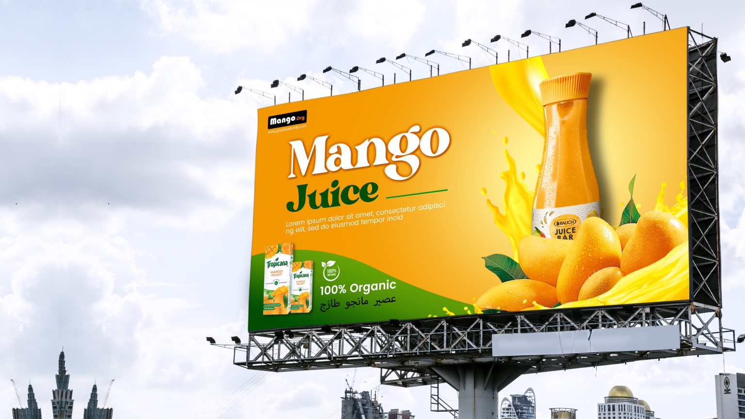 Large roadside billboard advertising mango juice, featuring a bright yellow background with a bottle of mango juice splashing into fresh mangoes, “Mango Juice” headline, and a “100% Organic” label.