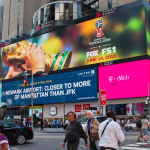Massive Times Square digital billboard displaying Shopify Black Friday campaign with real-time sales data.