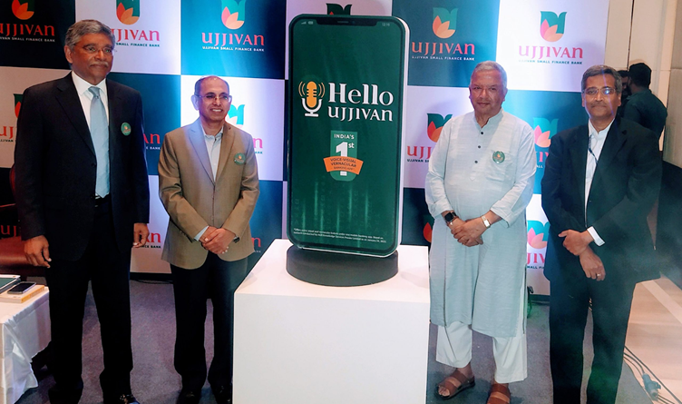 Ujjivan Bank Hello Ujjivan Launch Event Officials standing beside Hello Ujjivan digital banking display at launch event