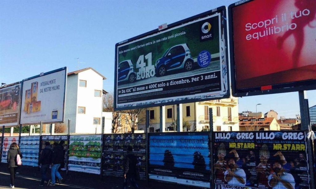 Dense OOH media placement strategy maximizing visibility across multiple brands in one location