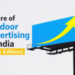 A large roadside billboard with a bright blue screen displays a bold yellow upward arrow, symbolizing growth. On the left side, text reads ‘Future of Outdoor Advertising in India (2026 Edition)’ in a clean, modern font against a light background.