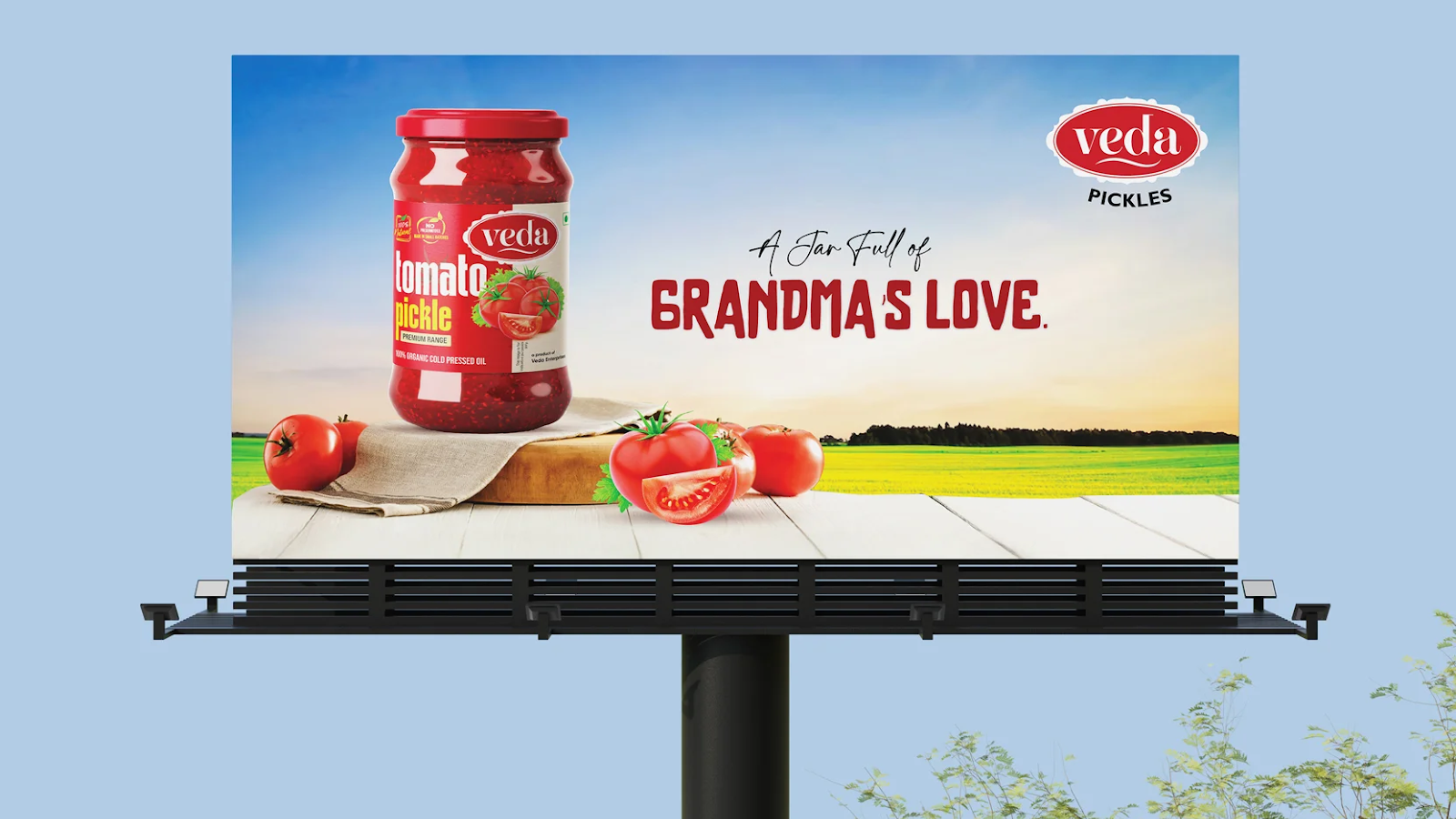 Veda Pickles outdoor billboard campaign with product branding Veda tomato pickle billboard with product display and brand message showcasing outdoor advertising