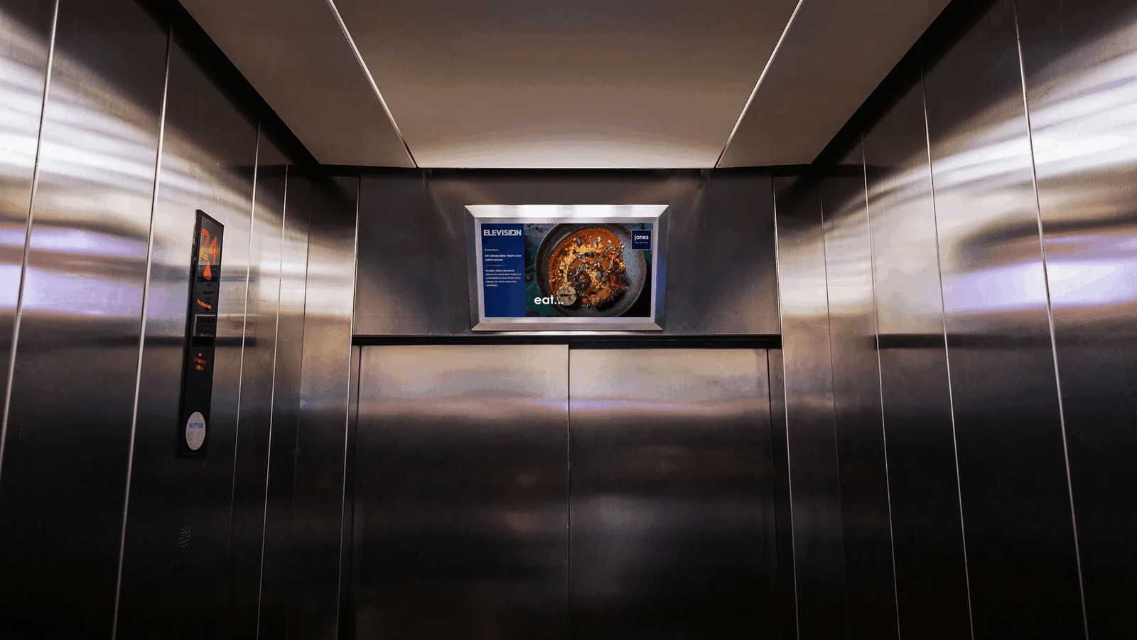 elevator digital screen advertising displaying brand content inside lift interior