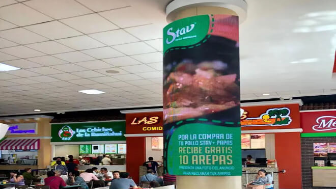 pillar wrap advertising in mall food court with vertical digital display branding