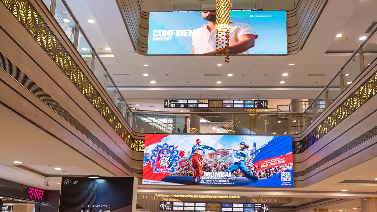 overhead hanging banner advertising in shopping mall for large scale brand visibility