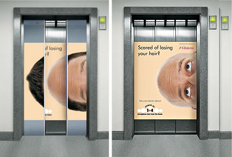 A creative elevator branding campaign uses the elevator doors as an interactive advertisement for a hair loss treatment brand, revealing a bald head visual when the doors close completely. The indoor advertising concept combines elevator door branding, visual storytelling, and high-engagement marketing to capture attention in commercial and residential buildings.